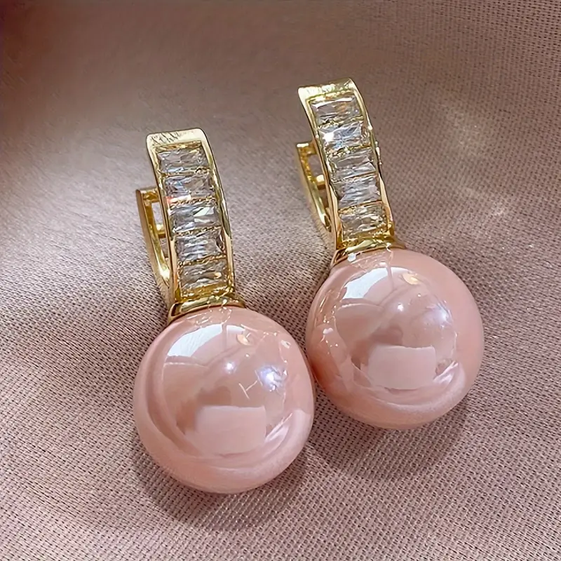 Pendientes de oro con circonitas y perla rosa