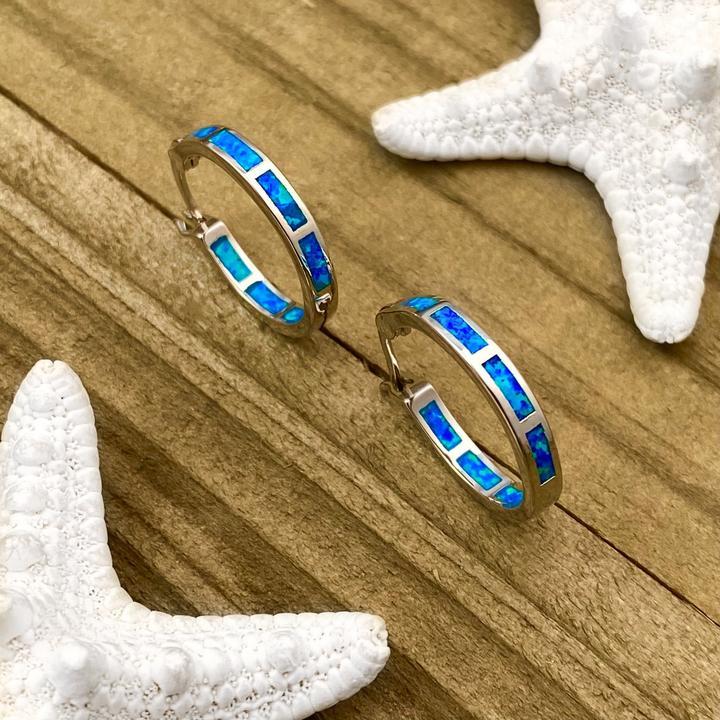 Pendientes de ópalo azul oceánico en plata